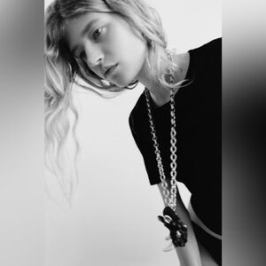 BNWT Zara limited edition, long metal link necklace with rhino shaped charm